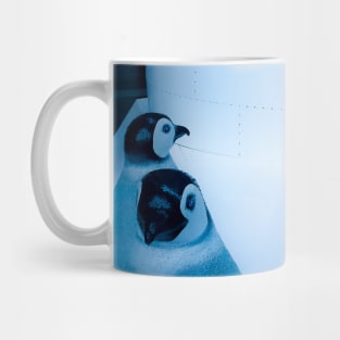 Igloo with a group of penguin sculptures Mug